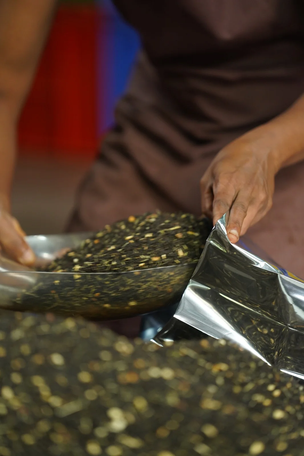 Careful packaging of organic artisan teas by hand